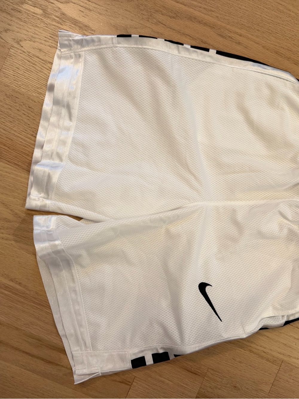Nike Elite White Mesh Athletic Shorts with Black Swoosh Accent